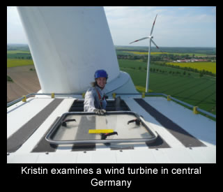 f11_art5_kristin_examines_wind_turbine