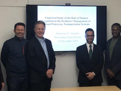 Dr Amodeo poses with his examining committee