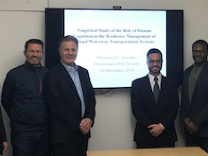 Dr Amodeo poses with his examining committee